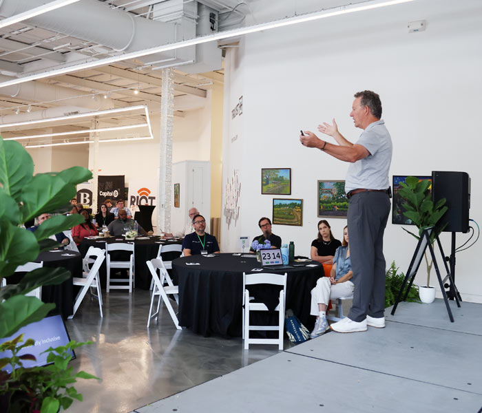 Photo of a man speaking at the Gig East Summit