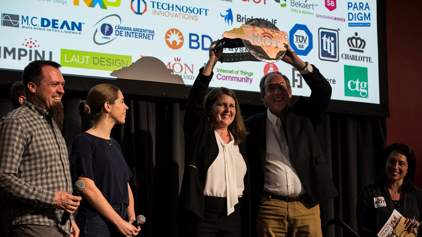 Winners holding up award at Gig East NCRiOT
