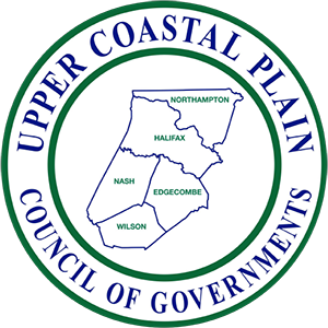 Upper Coastal Plain Council of Governments Logo - Blue serif type inside white circle with green borders and map of NC cities